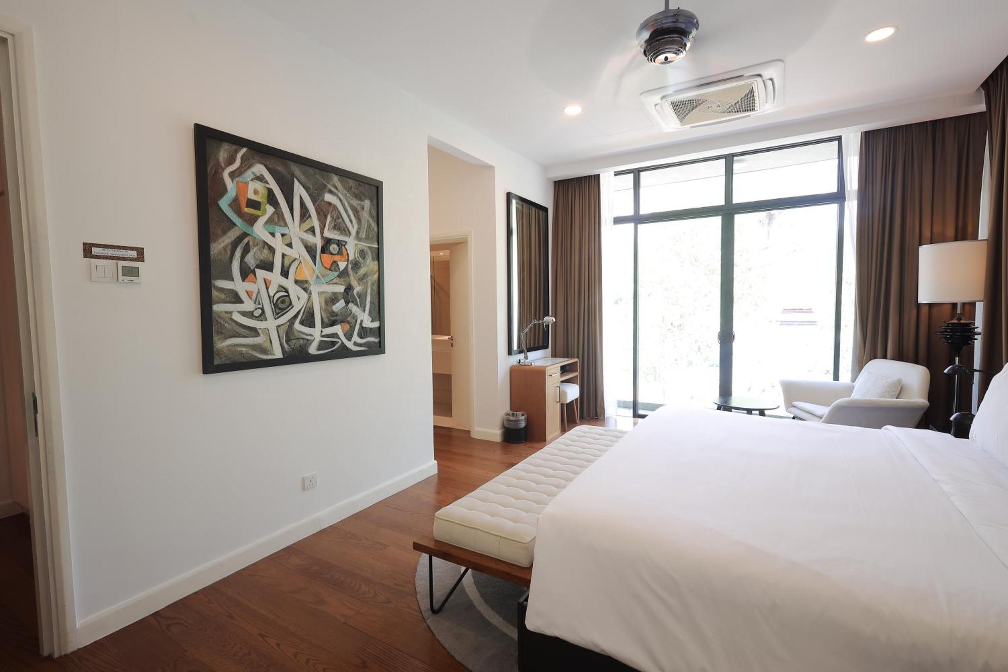The Riyaz Lavanya Langkawi ปันไตเจอนัง ภายนอก รูปภาพ A bedroom at the hotel